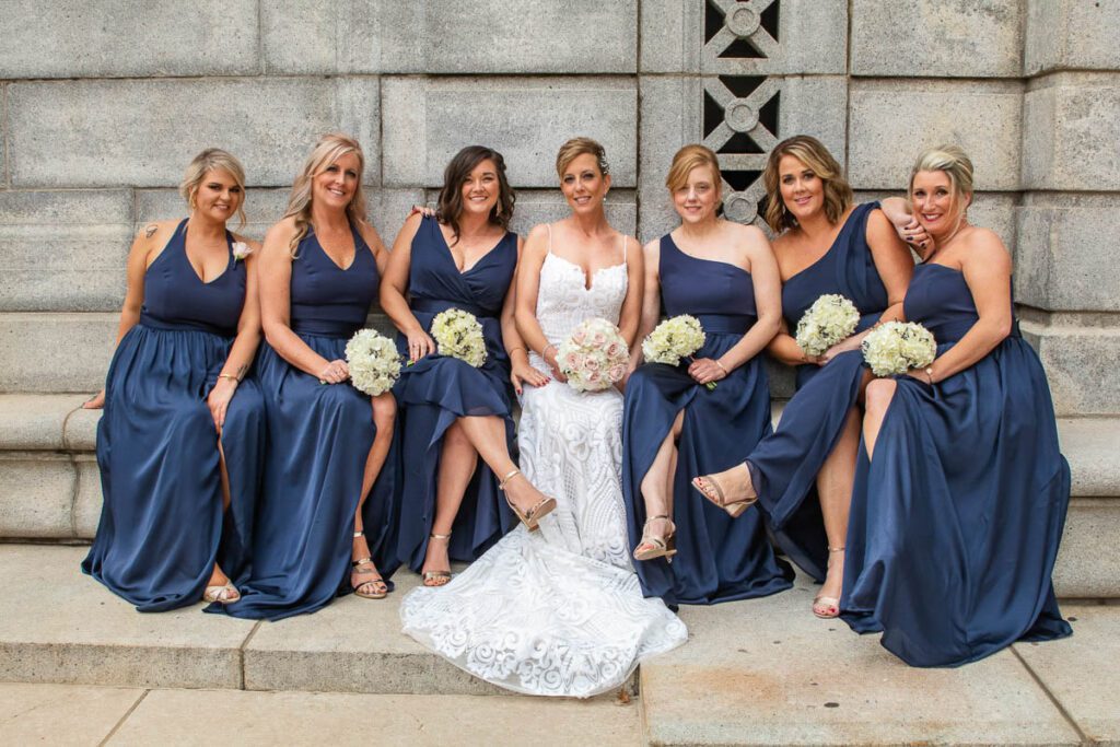Laura sitting with her bridesmaids