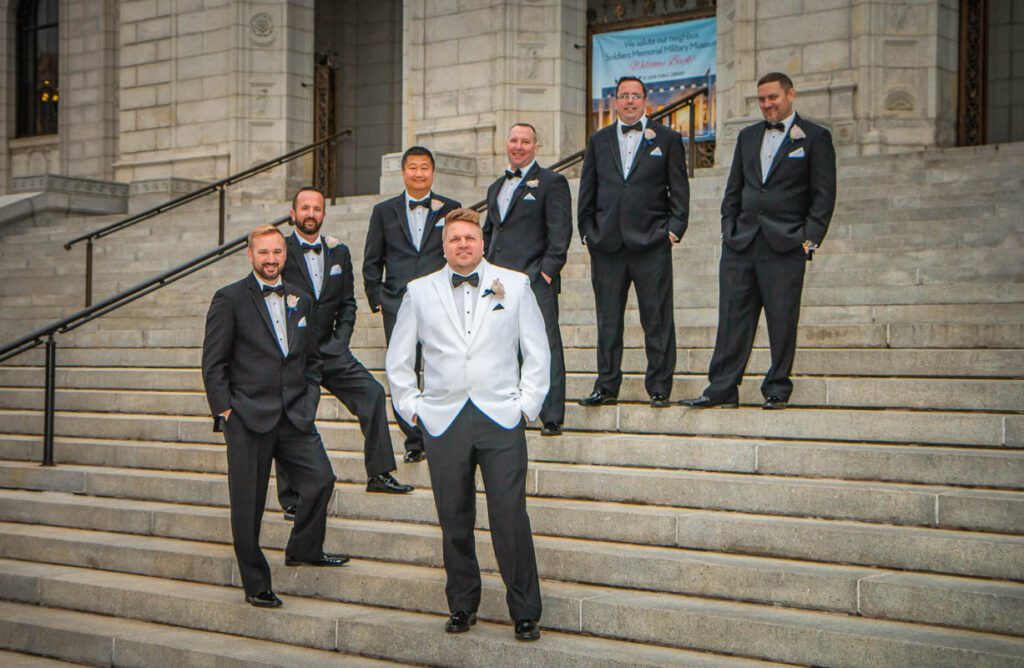 Michael with his groomsmen along the stone stairs
