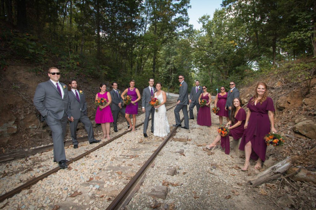 Chad and Jessie with their attendants around the old railroad