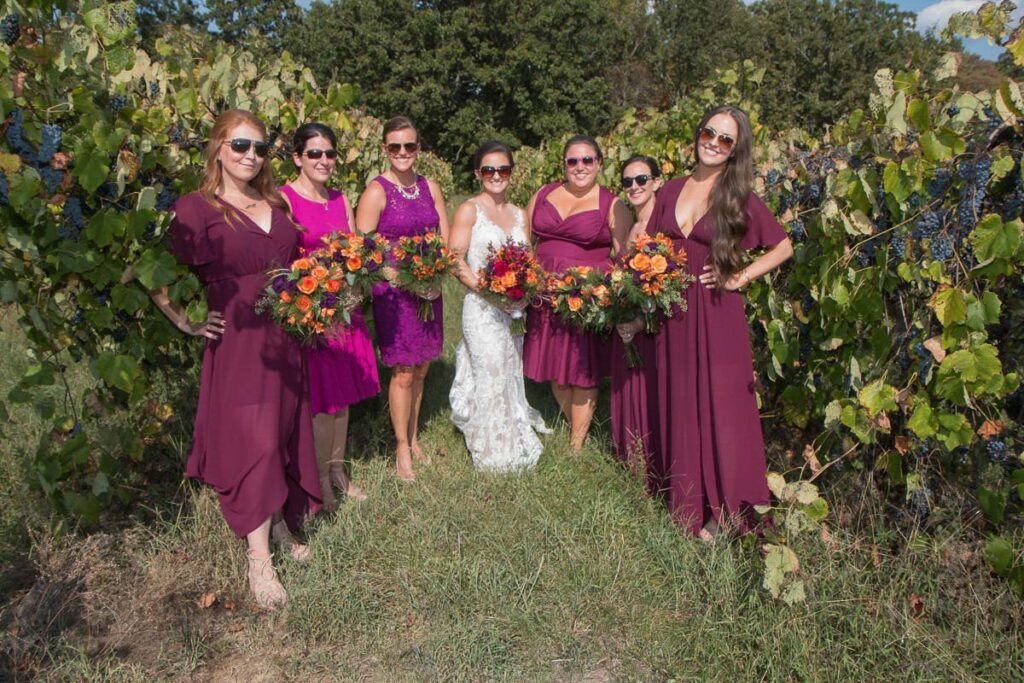 Jessie and her bridesmaids surrounded by berries