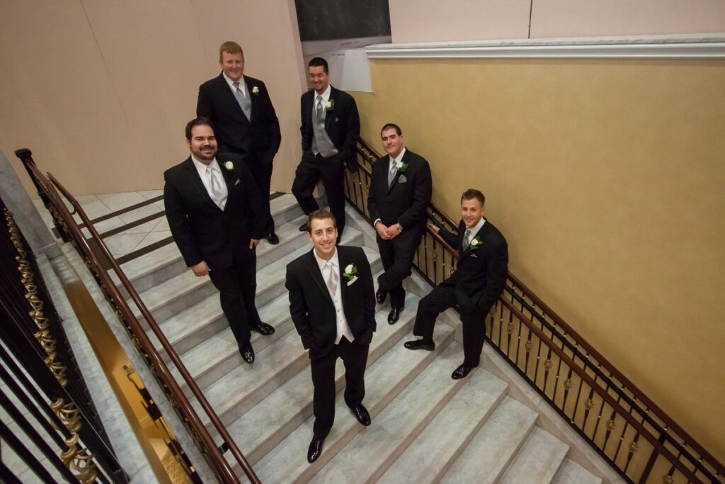 Nathan and his groomsmen on the stairs