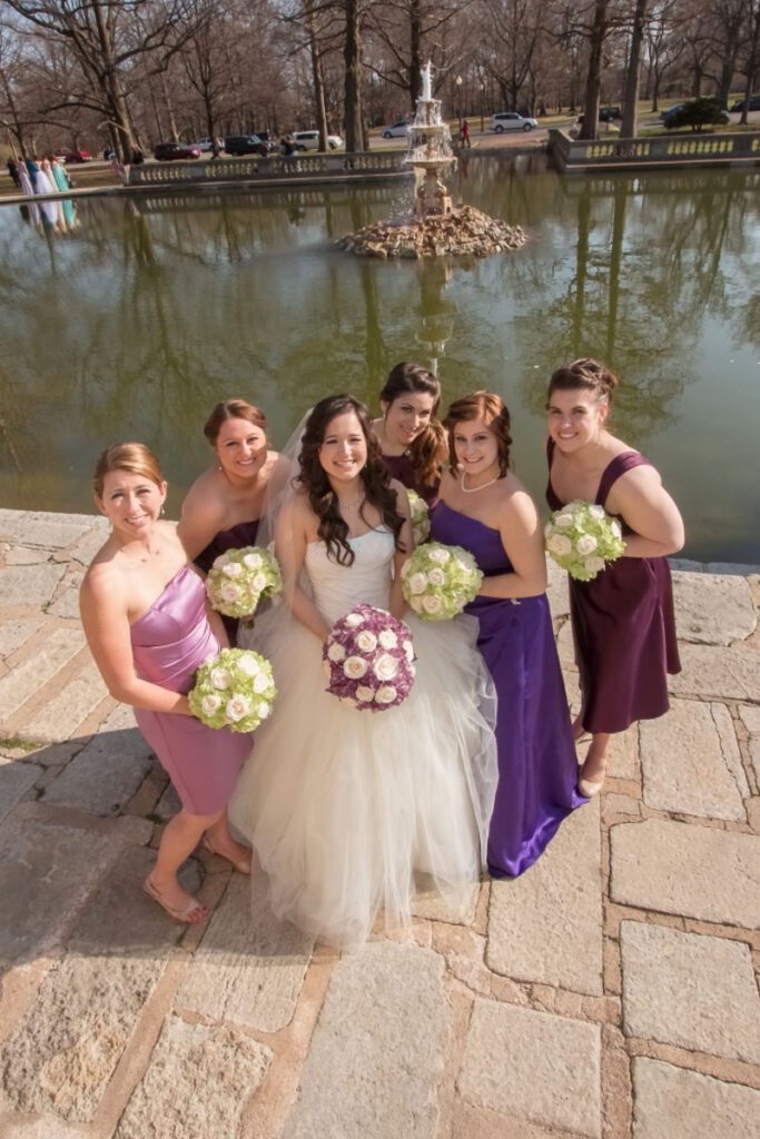 Sarah and her bridesmaids near water