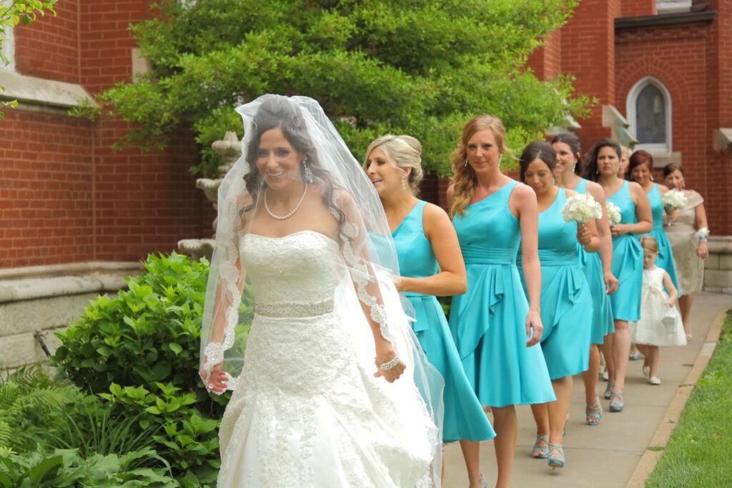 Kiley walking to the venue with her bridesmaids