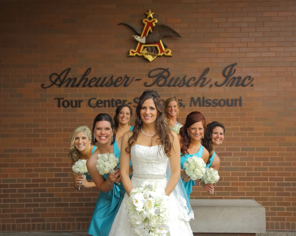 Kiley and her bridesmaids in front of Anheuser-Busch, Inc.
