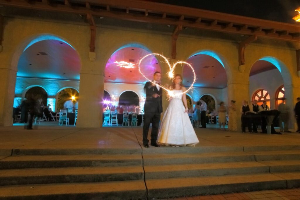 Kiley and Jason doing a light effect with a sparkler