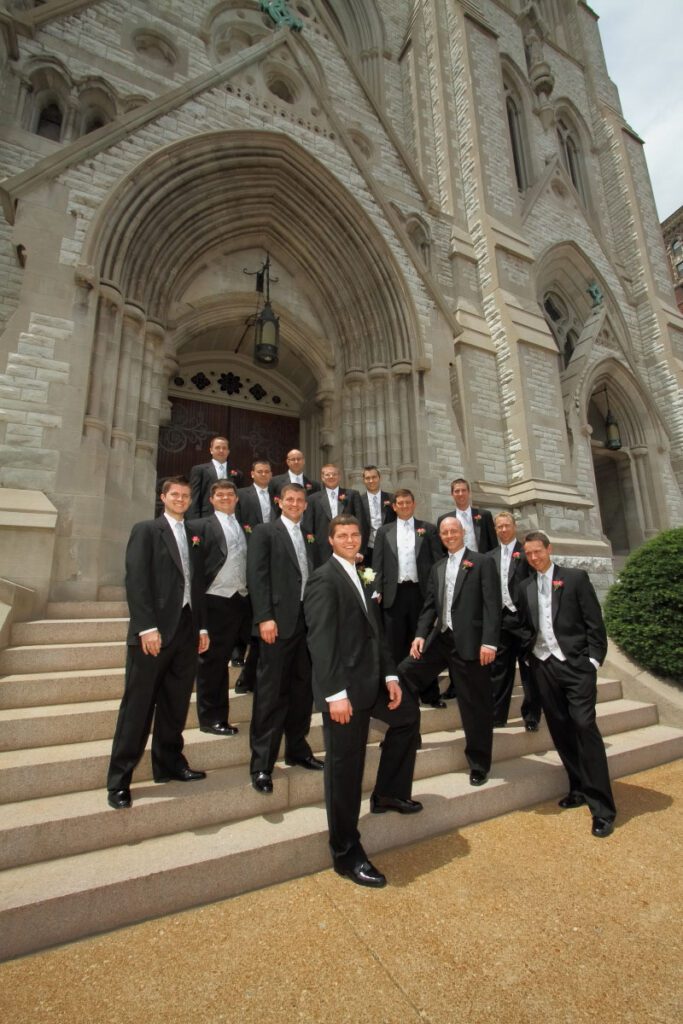 Kurt and his groomsmen outside the church