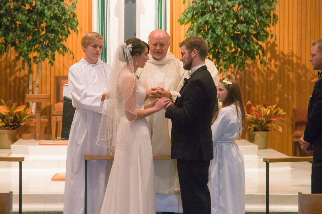 Casey and Joseph exchanging vows