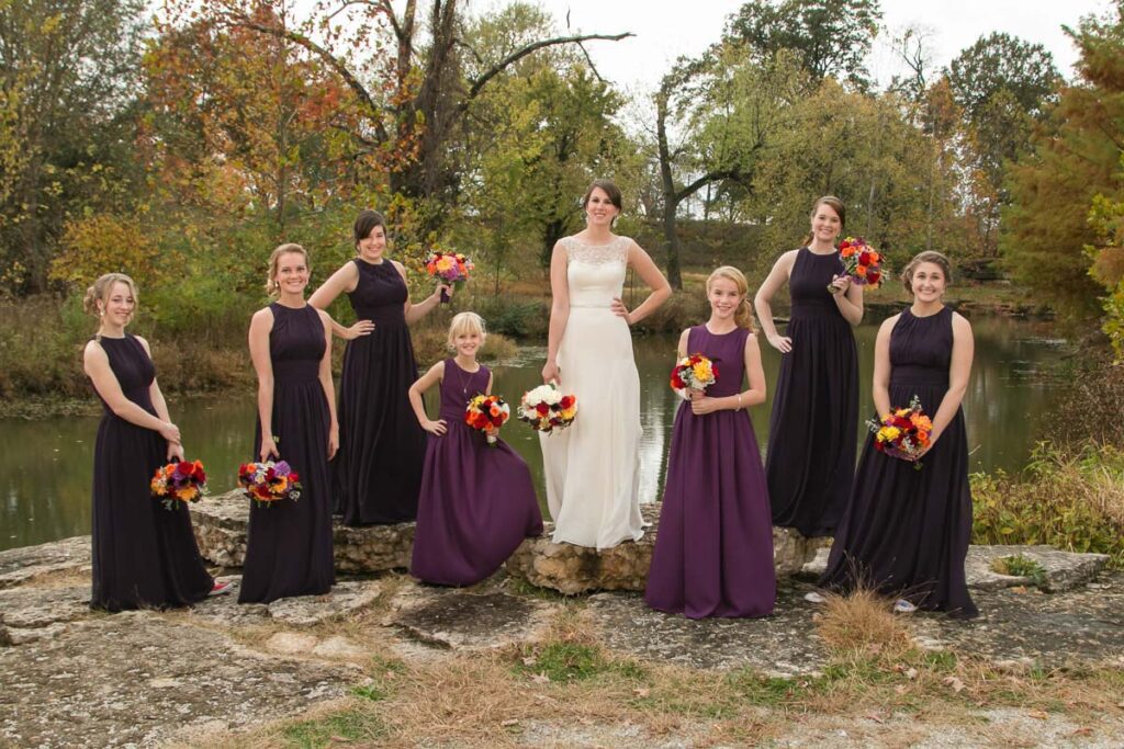 Casey and her bridesmaids near the pond
