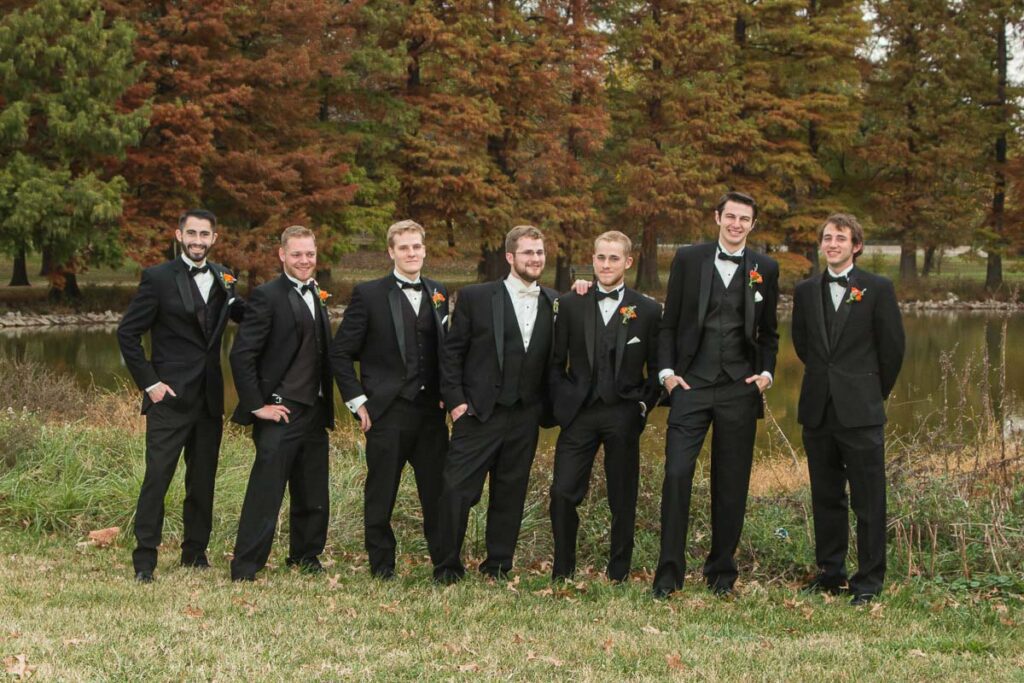 Joseph with his groomsmen by the pond