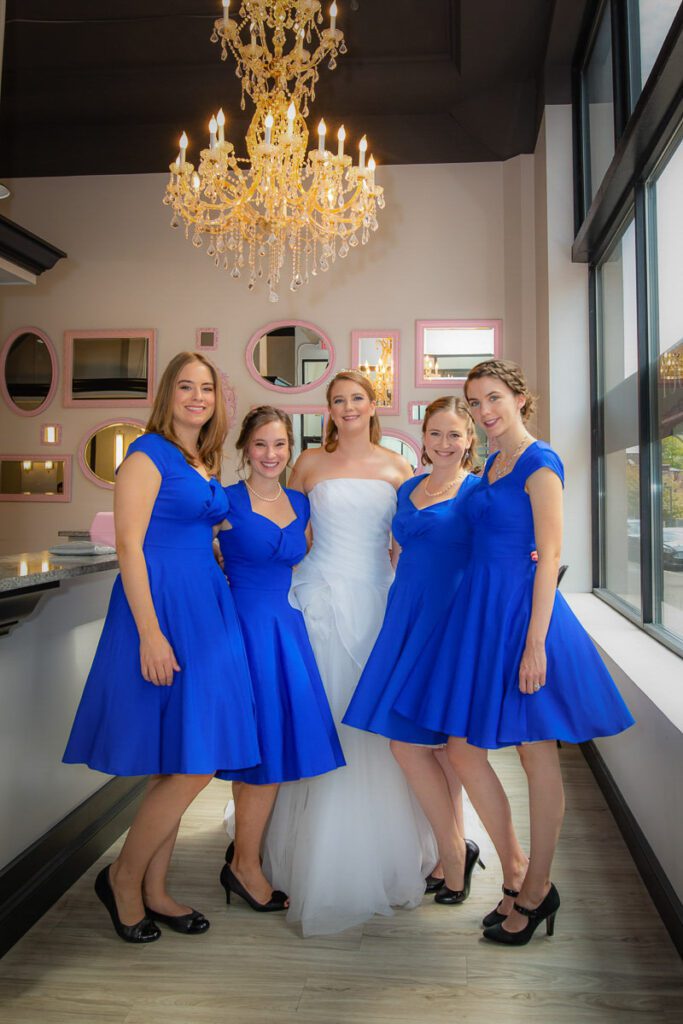 Sarah and her bridesmaids wearing their dresses