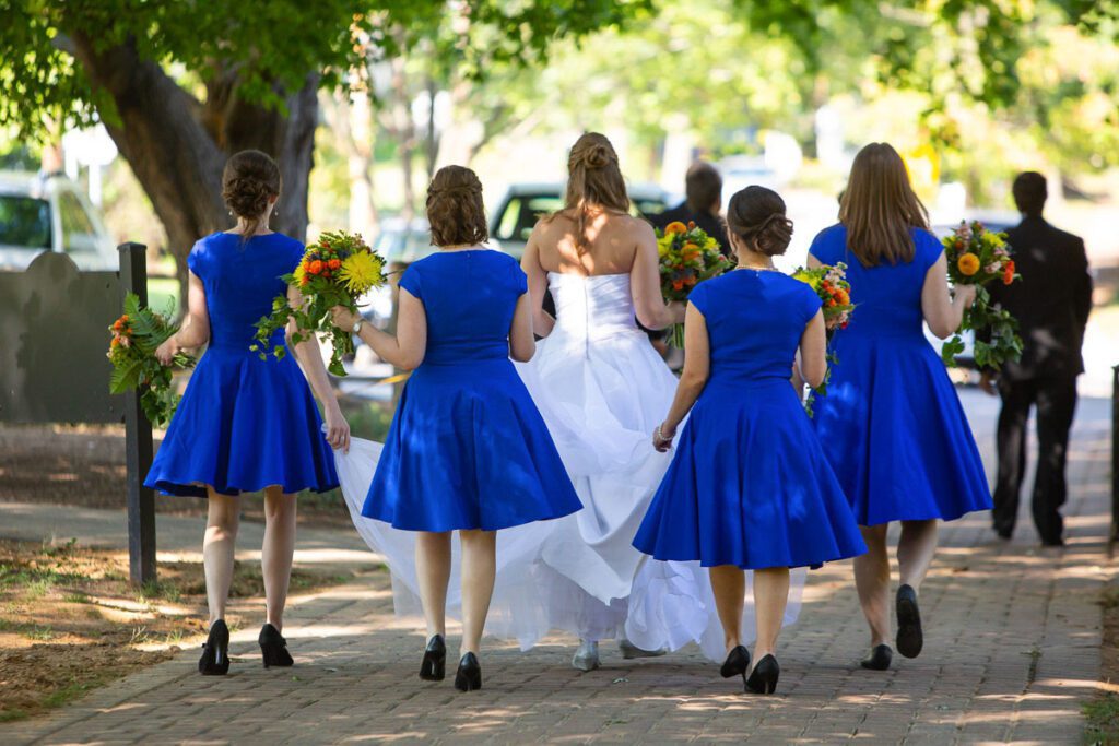 Sarah walking with her bridesmaids