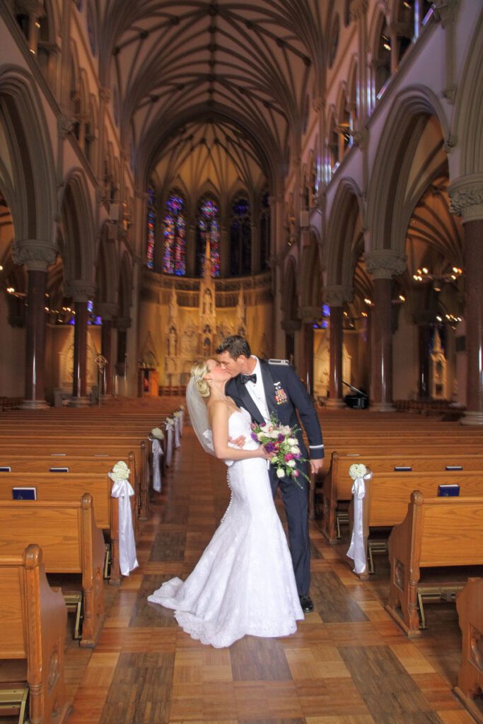 Elizabeth and Ryan kiss at the aisle
