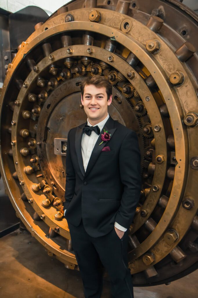 Nick standing in front of a vault door