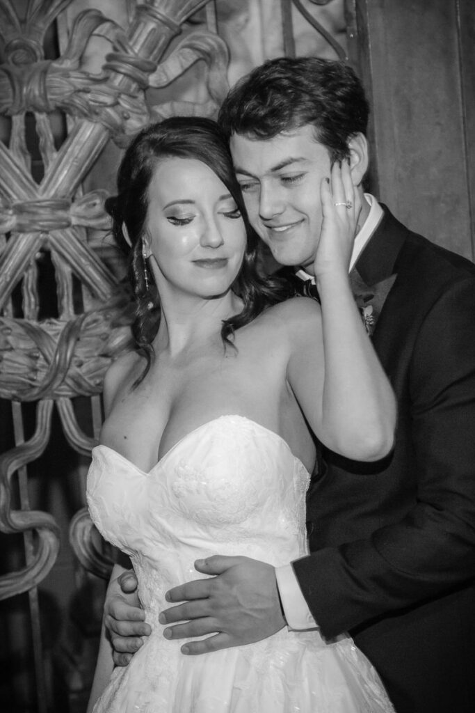Kelsey and Nick holding each other intimately grayscaled