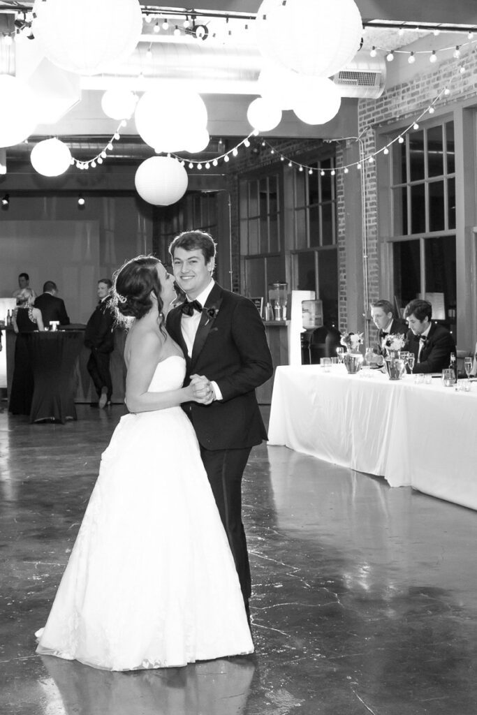 Kelsey and Nick dancing in a grayscale filter