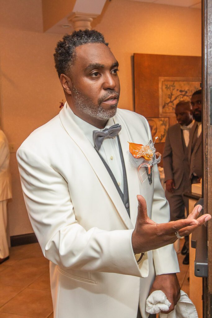 Tyrone in his white wedding suit