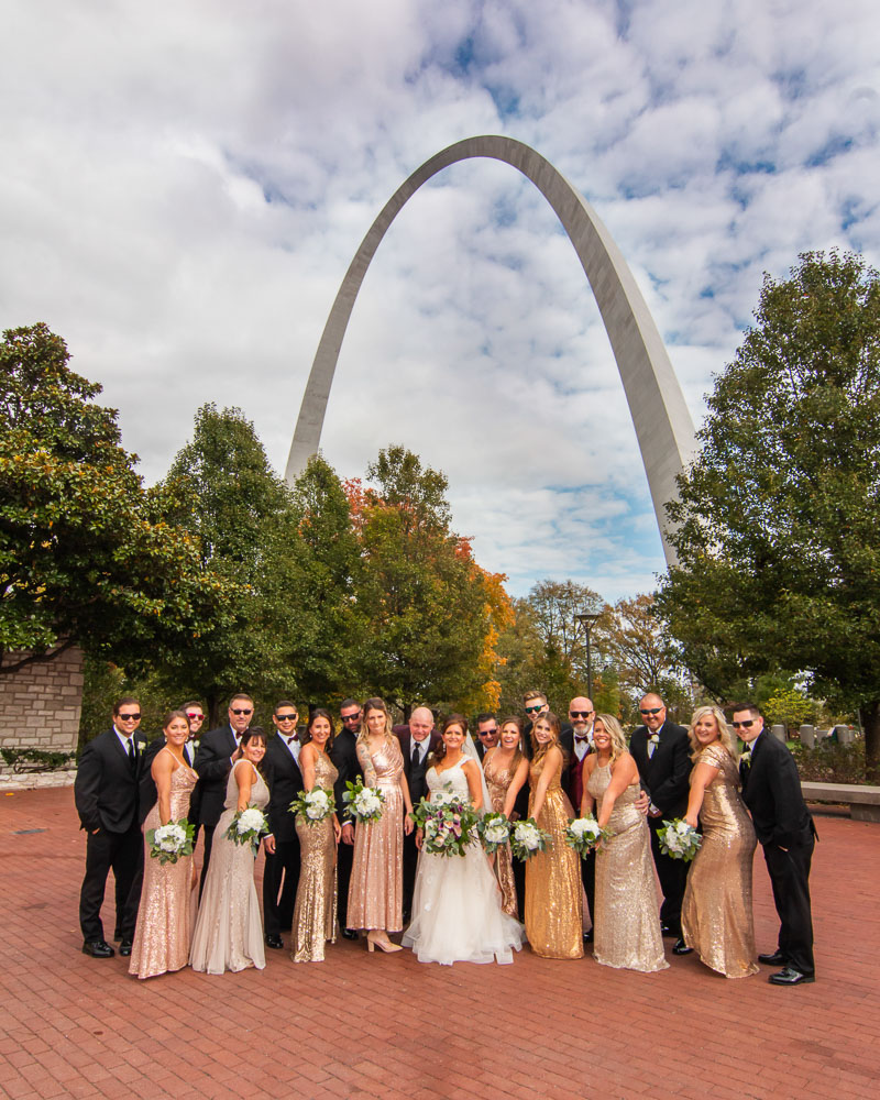 Nicole and Jason with their attendants near the Gateway Arch