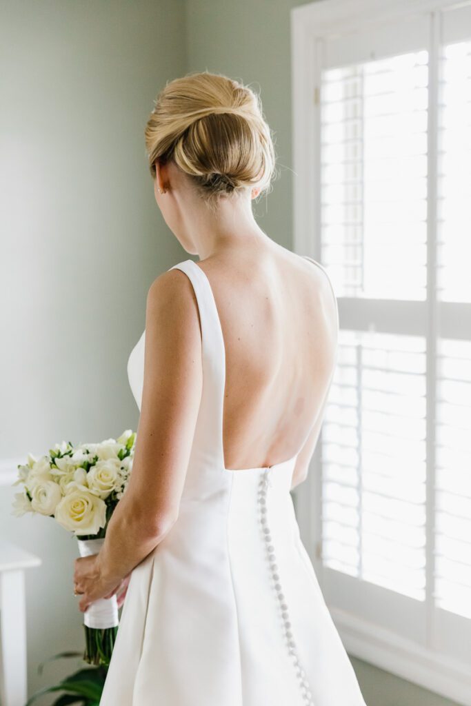 Laura in her white wedding dress