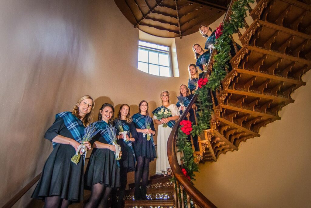 Ariana and her bridesmaids on a spiral staircase