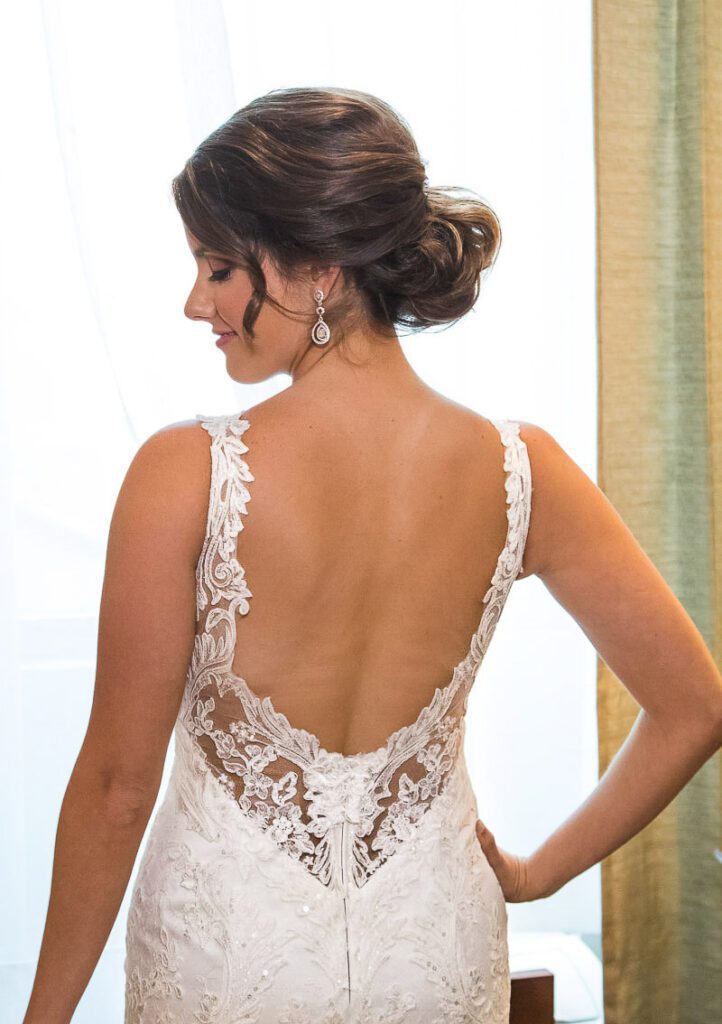 Carolyn and the back of her wedding gown