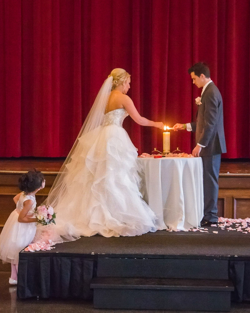 Danica and Kristoff lighting a candle