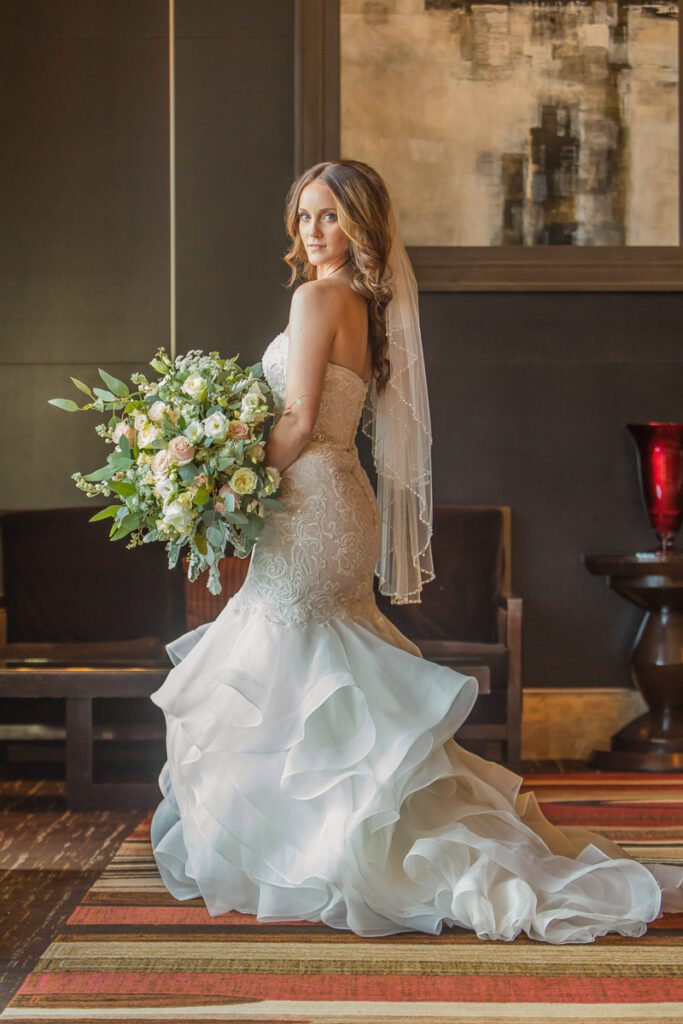 Brianna in her gown with a bouquet
