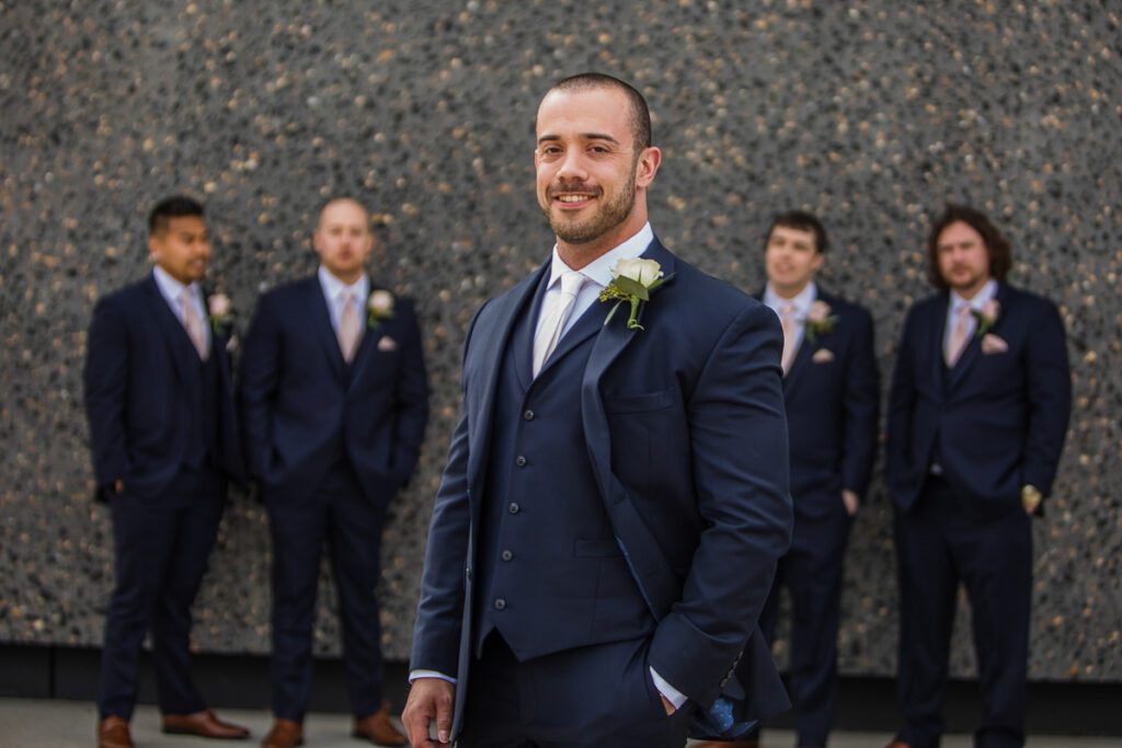 Seth with his groomsmen at the back