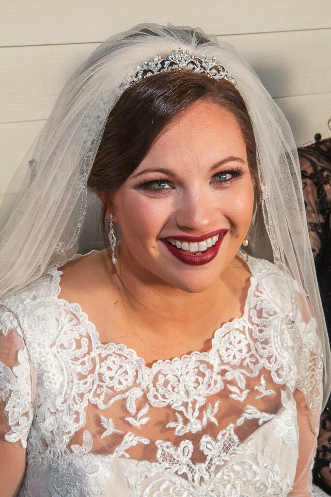 Gwyn smiling in her wedding dress