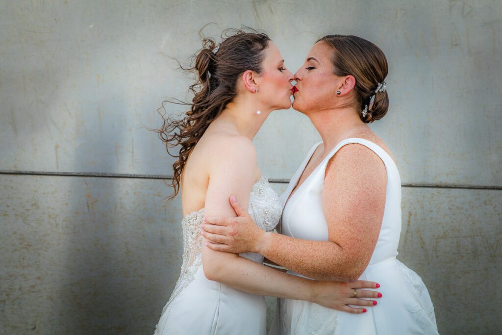 Brides sharing a sweet kiss