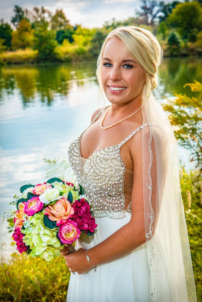 Kelley smiling while holding her flowers