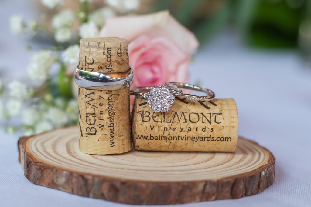 Wedding rings on Belmont Vineyards carved wood