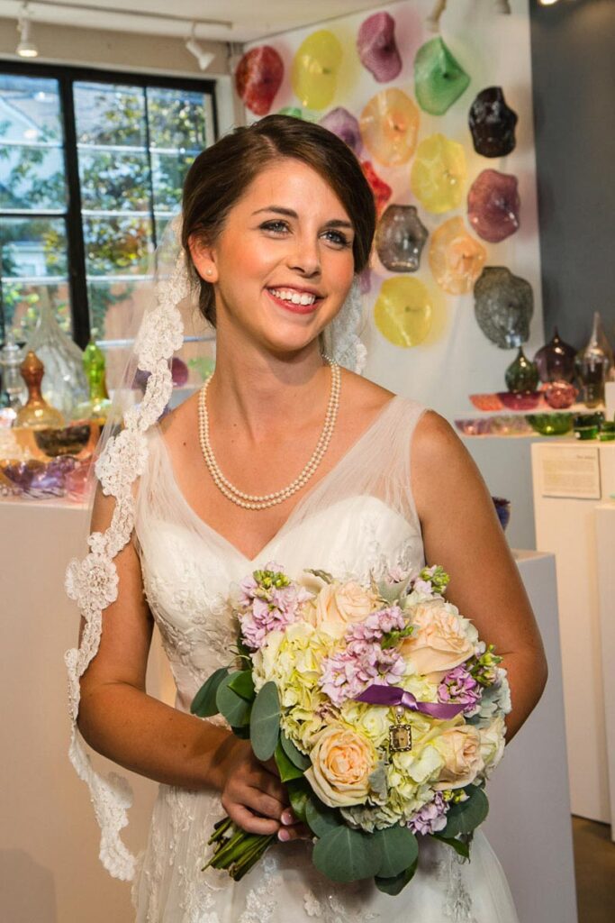 A bride holding her bouquet of flowers