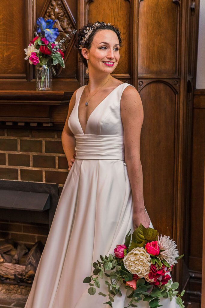 Claire smiling in her wedding dress