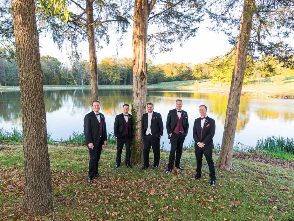 Anthony and his groomsmen by the pond