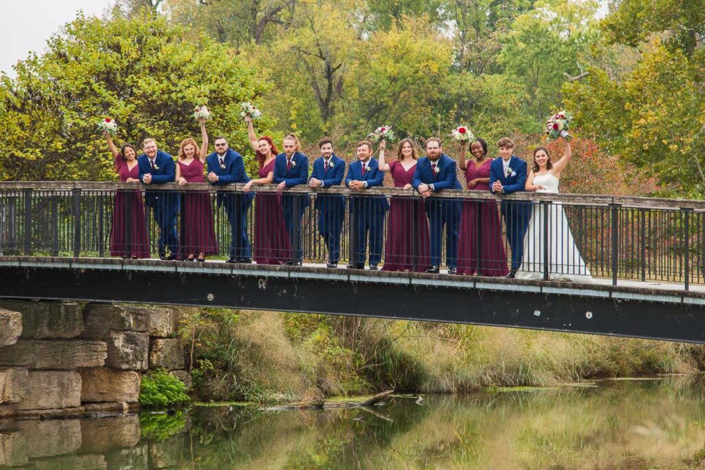 Rachel and Jonathan with their attendants on a bridge