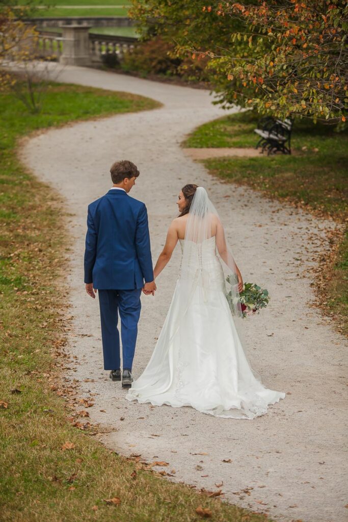 Rachel and Jonathan holding hands while walking