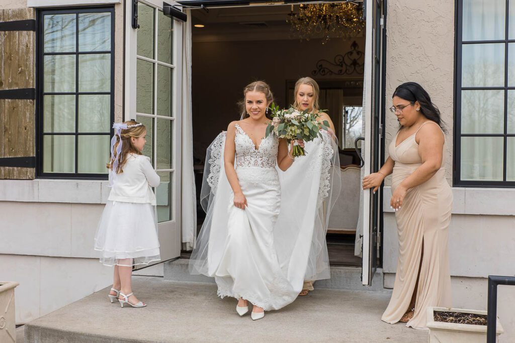 Bride walking with bouquet