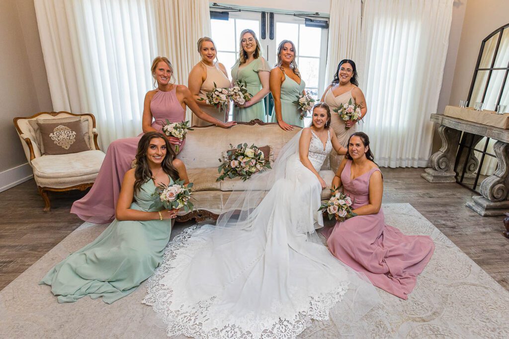 Bride and Bridesmaid posing with bouquets