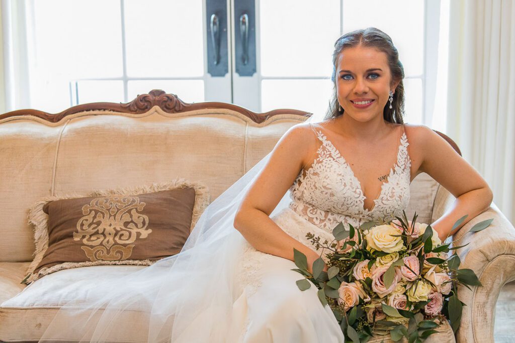 A close shot of bride with bouquet