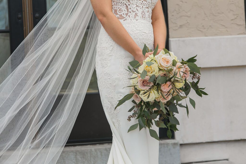 A close shot of bride holding a bouquet